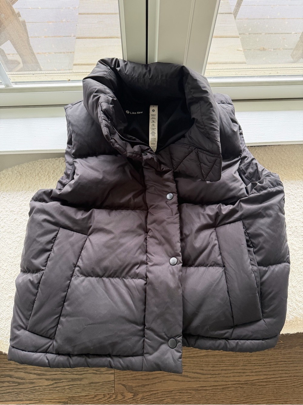 Lululemon like new barely worn black puffer vest with detachable hood.